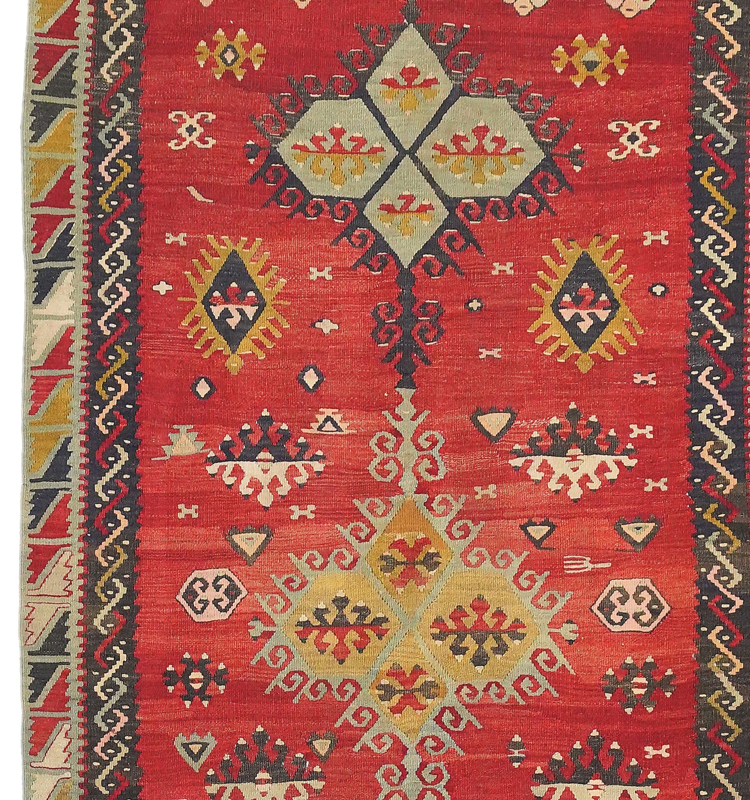 Détail du tissage en laine du kilim Sarkisla ancien – médaillons géométriques rouge, crème et ocre, tissé à la main, Anatolie Centrale