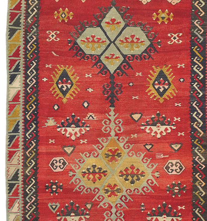 Détail du tissage en laine du kilim Sarkisla ancien – médaillons géométriques rouge, crème et ocre, tissé à la main, Anatolie Centrale